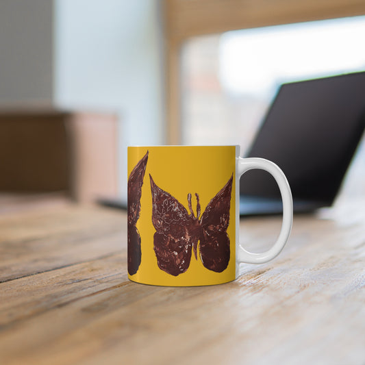 BROWN BUTTERFLY ON YELLOW MUG